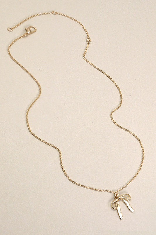 GOLD BOW PENDANT NECKLACE